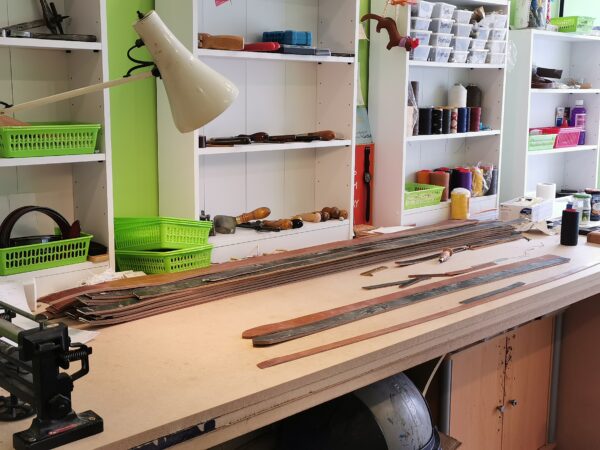 Main workbench at The Belt Makers, 119 Fore Street, Exeter, EX4 3JQ, UK
