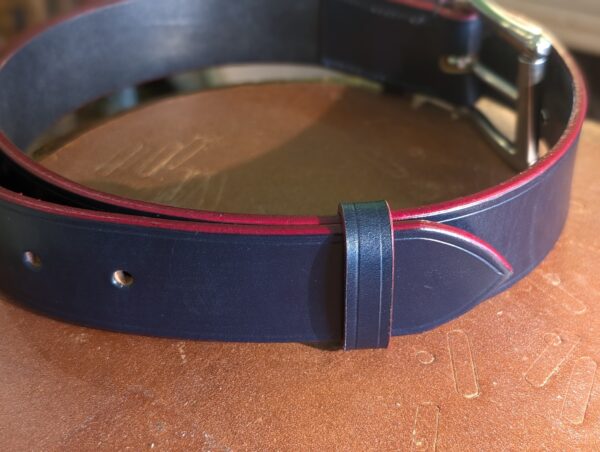 Leather in Blue and Red in stock, 35.5 (2024) - tail end and red edge detail