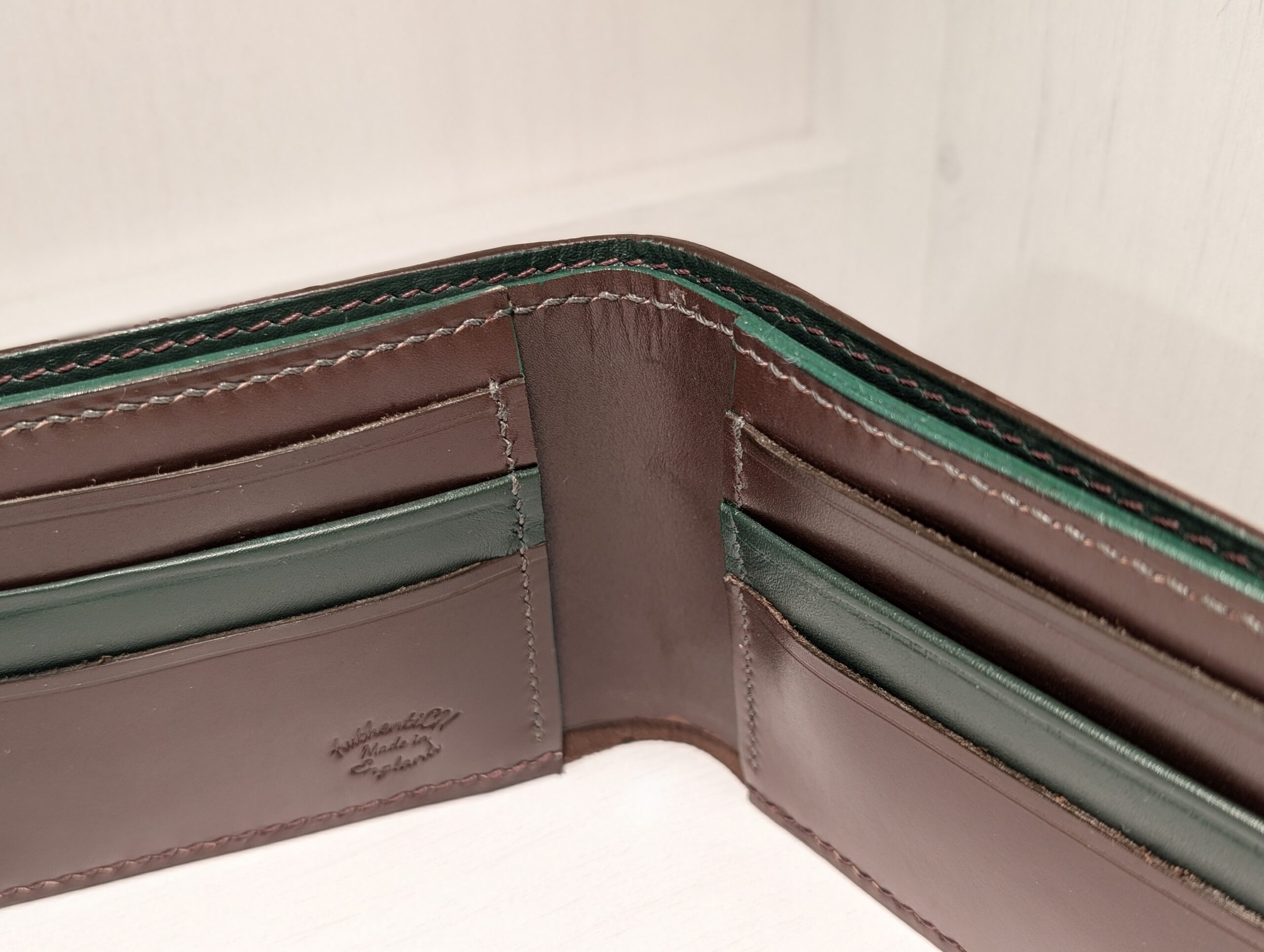 Luxury Brown and Green Handmade Leather Wallet by Catalin Neagu - green trim detail